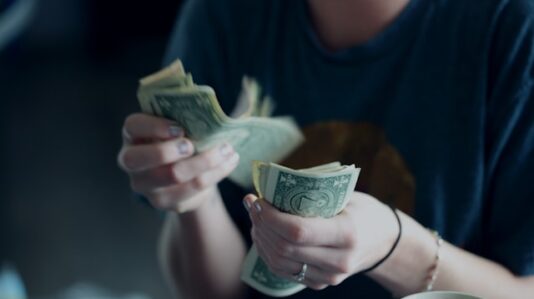 a person counting money