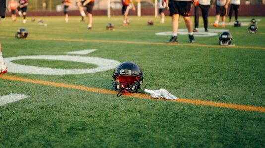 football helmets on the field