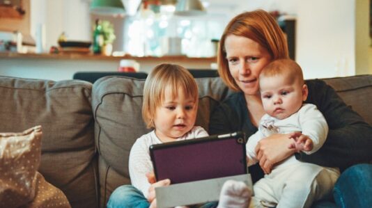 a woman with 2 children