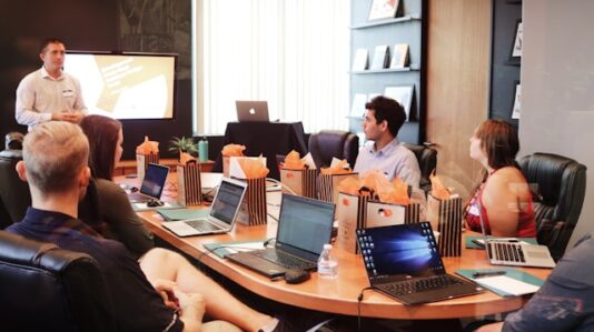 a group of people having a meeting